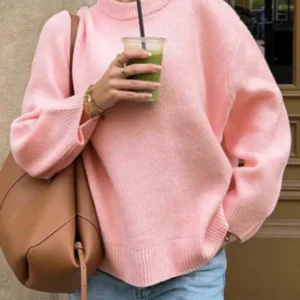 Różowy sweter z golfem oversize dzianinowy Różowy