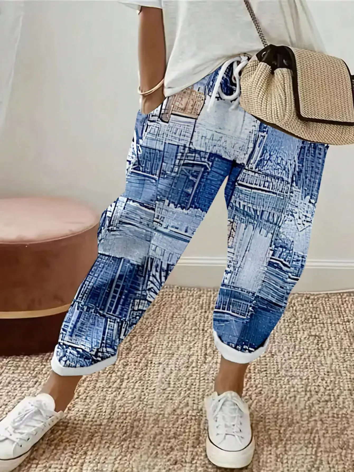 Spodnie damskie plus size w kwiaty z kieszeniami Błękitny