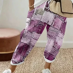Spodnie damskie plus size w kwiaty z kieszeniami Fioletowy