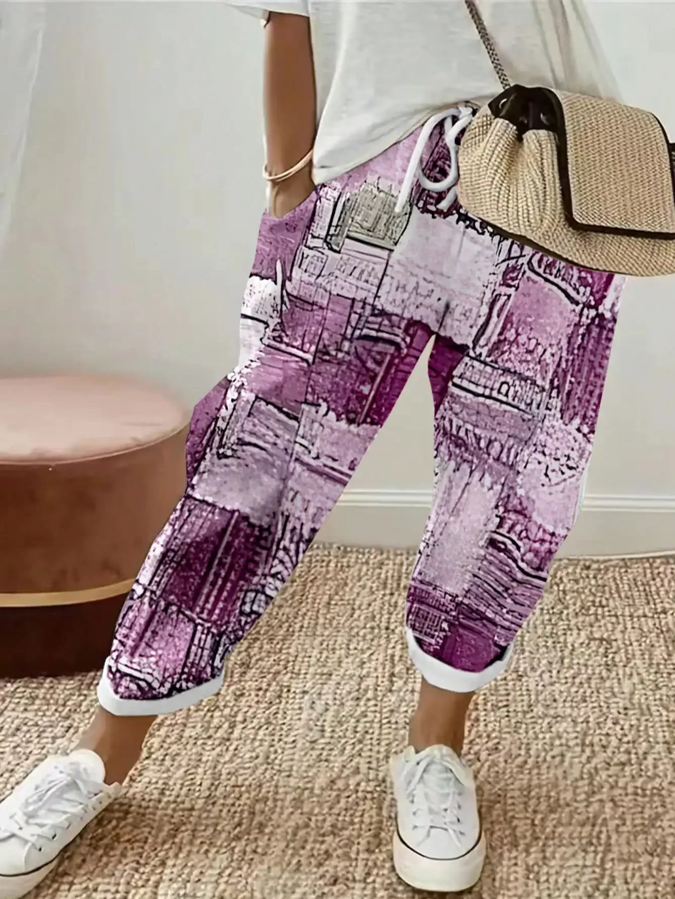 Spodnie damskie plus size w kwiaty z kieszeniami Fioletowy