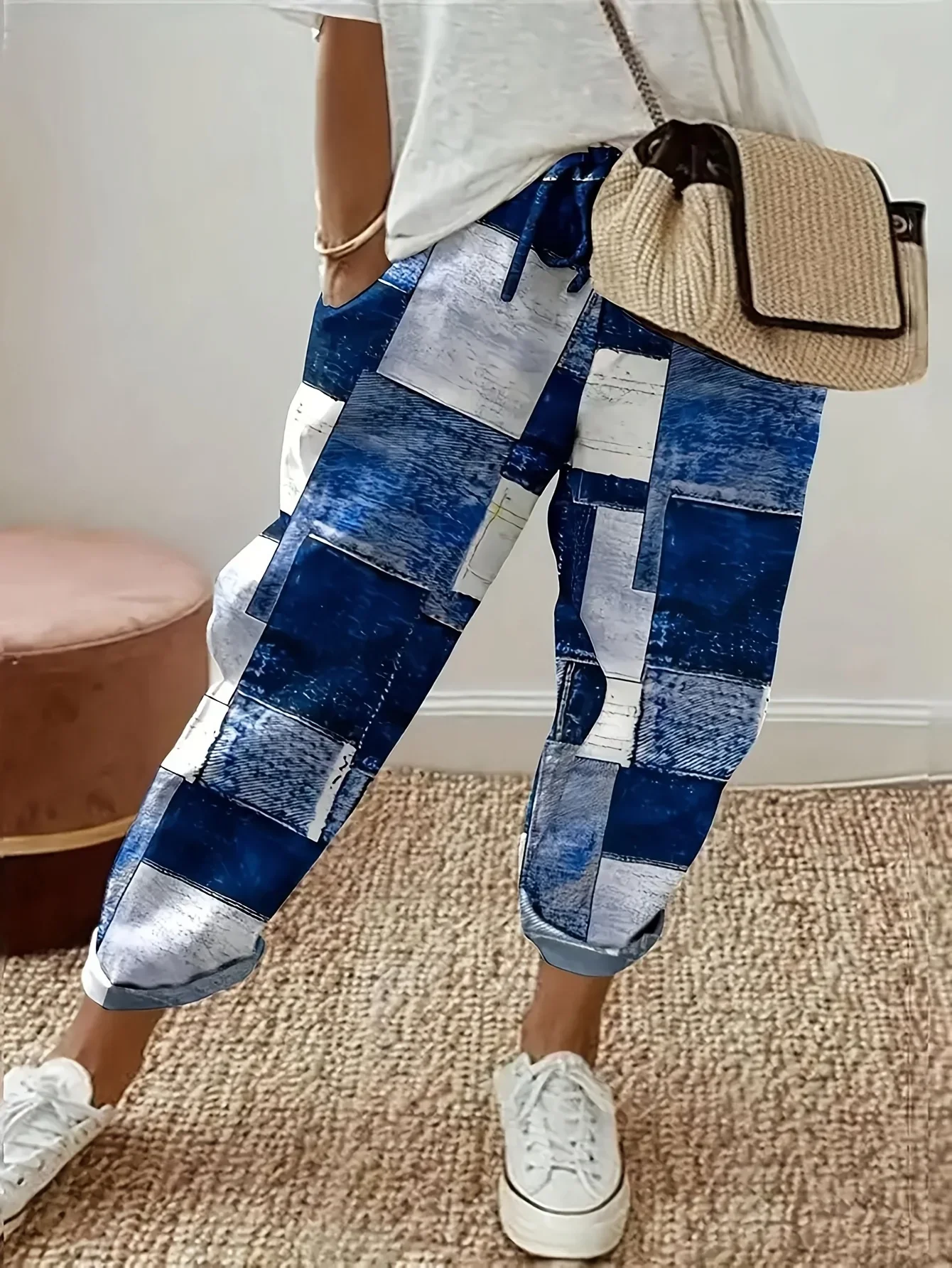 Spodnie damskie plus size w kwiaty z kieszeniami Niebieski