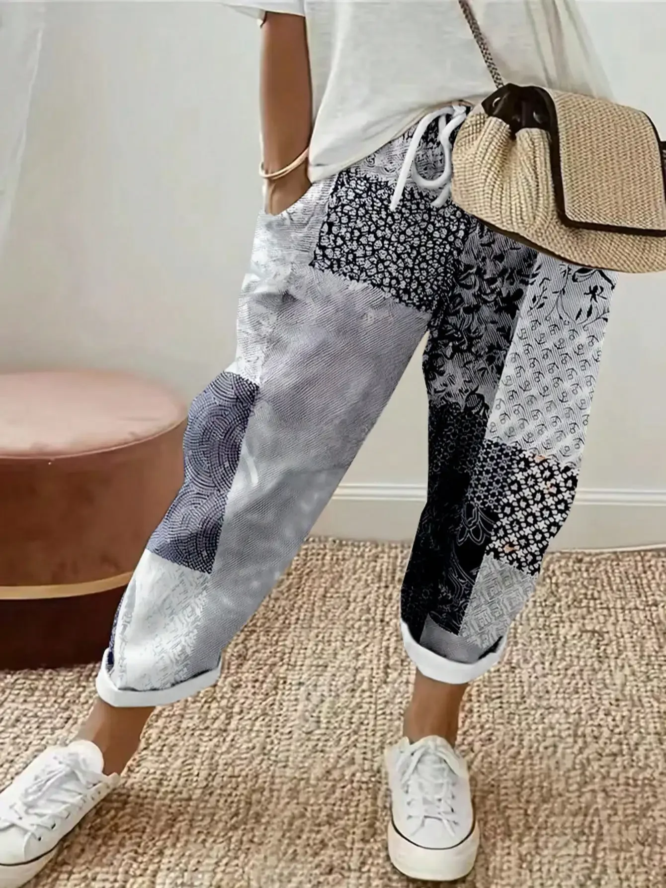 Spodnie damskie plus size w kwiaty z kieszeniami Szary
