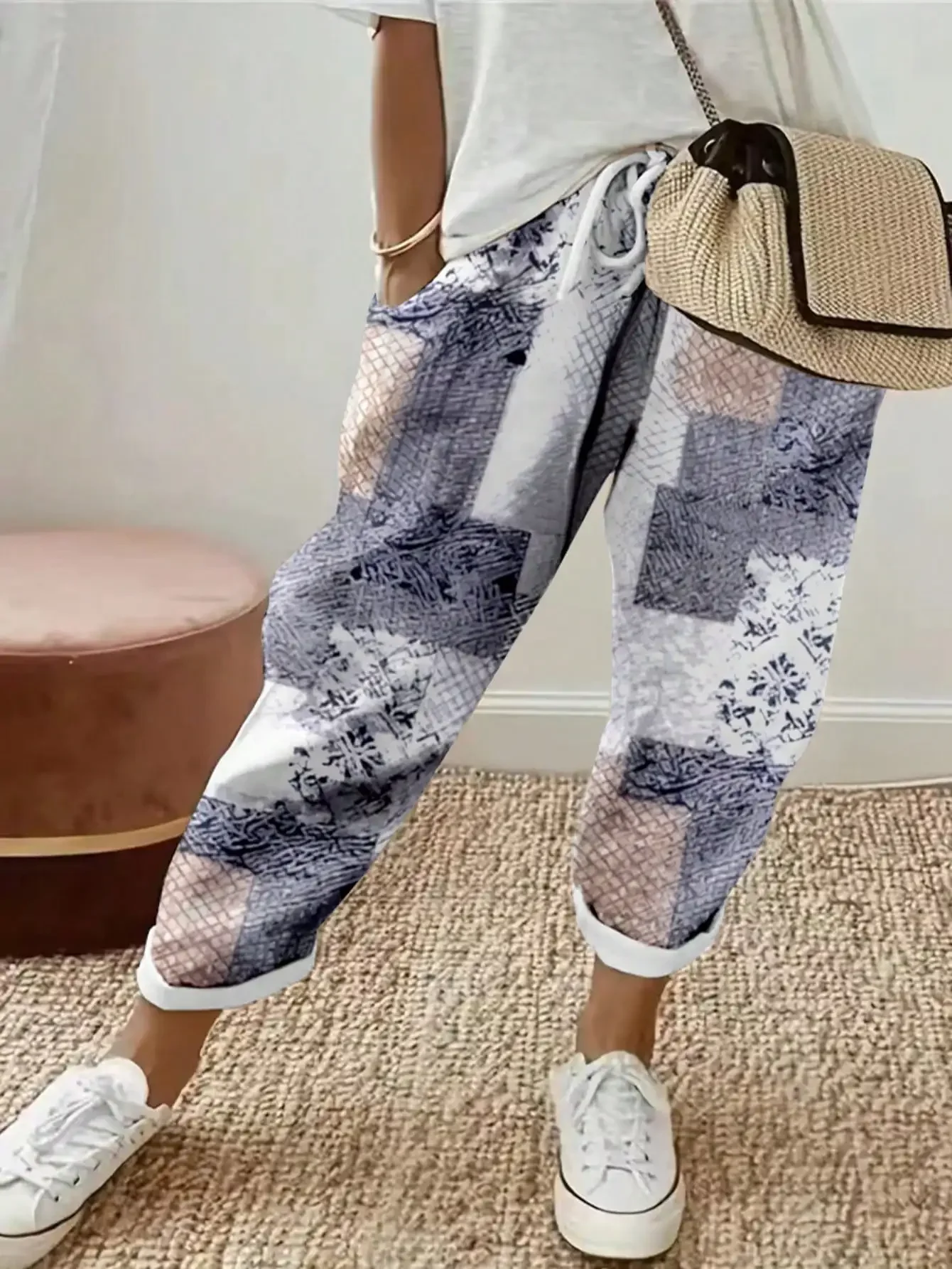 Spodnie damskie plus size w kwiaty z kieszeniami Wielo