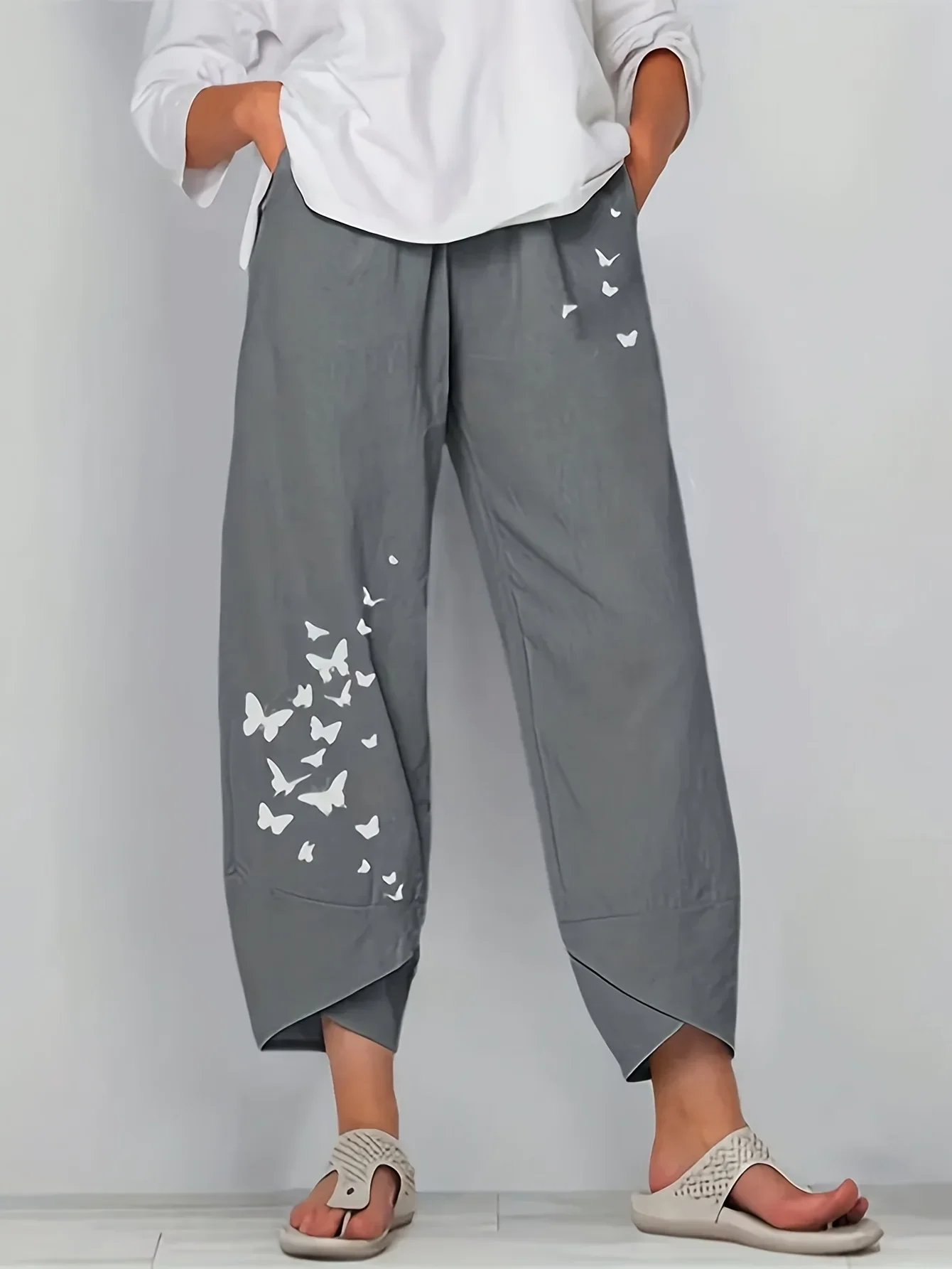 Spodnie damskie plus size z motylkami i gumka w pasie Szary