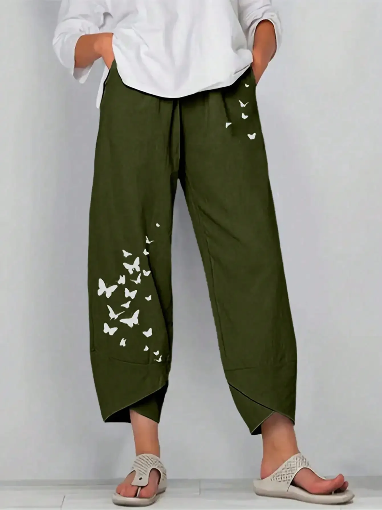 Spodnie damskie plus size z motylkami i gumka w pasie Zielony