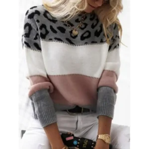 Sweter damski z kontrastowym wzorem w panterkę Różowy