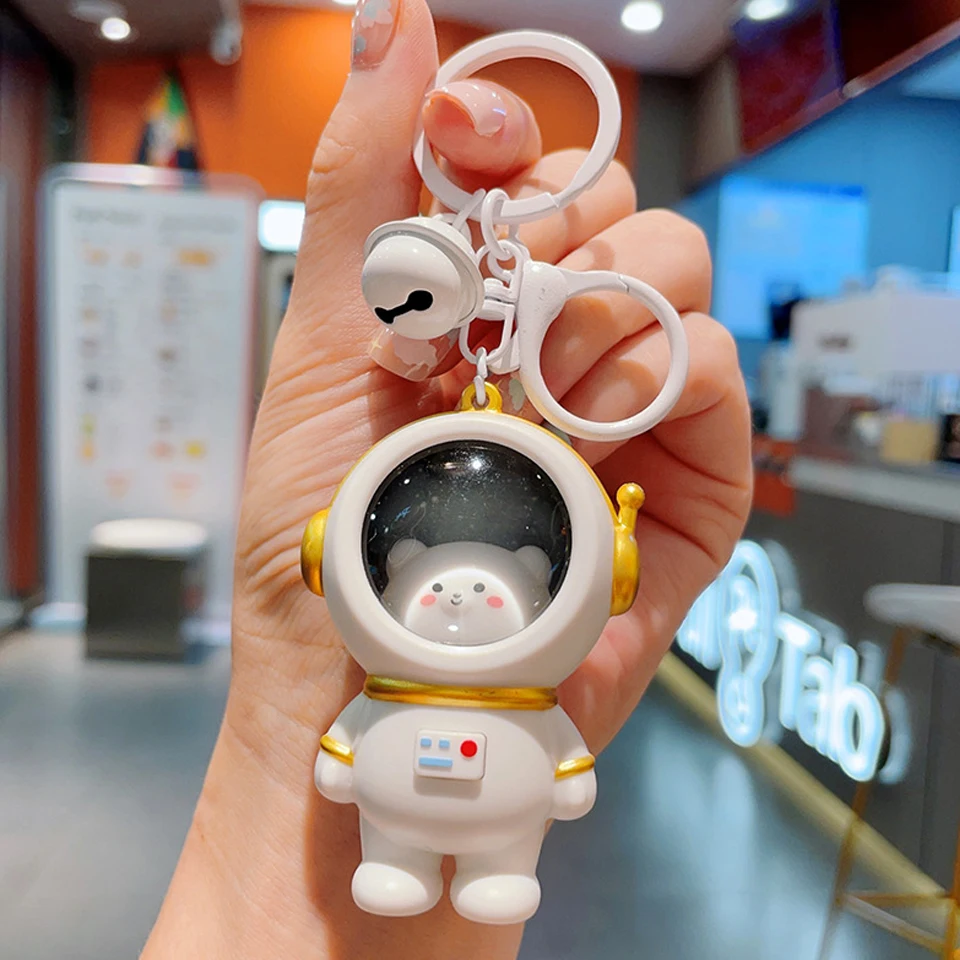 Świecący brelok astronauta kot - zawieszka do torby żółty