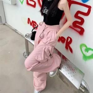 Szerokie spodnie cargo z kieszeniami – streetwear oversize Różowy