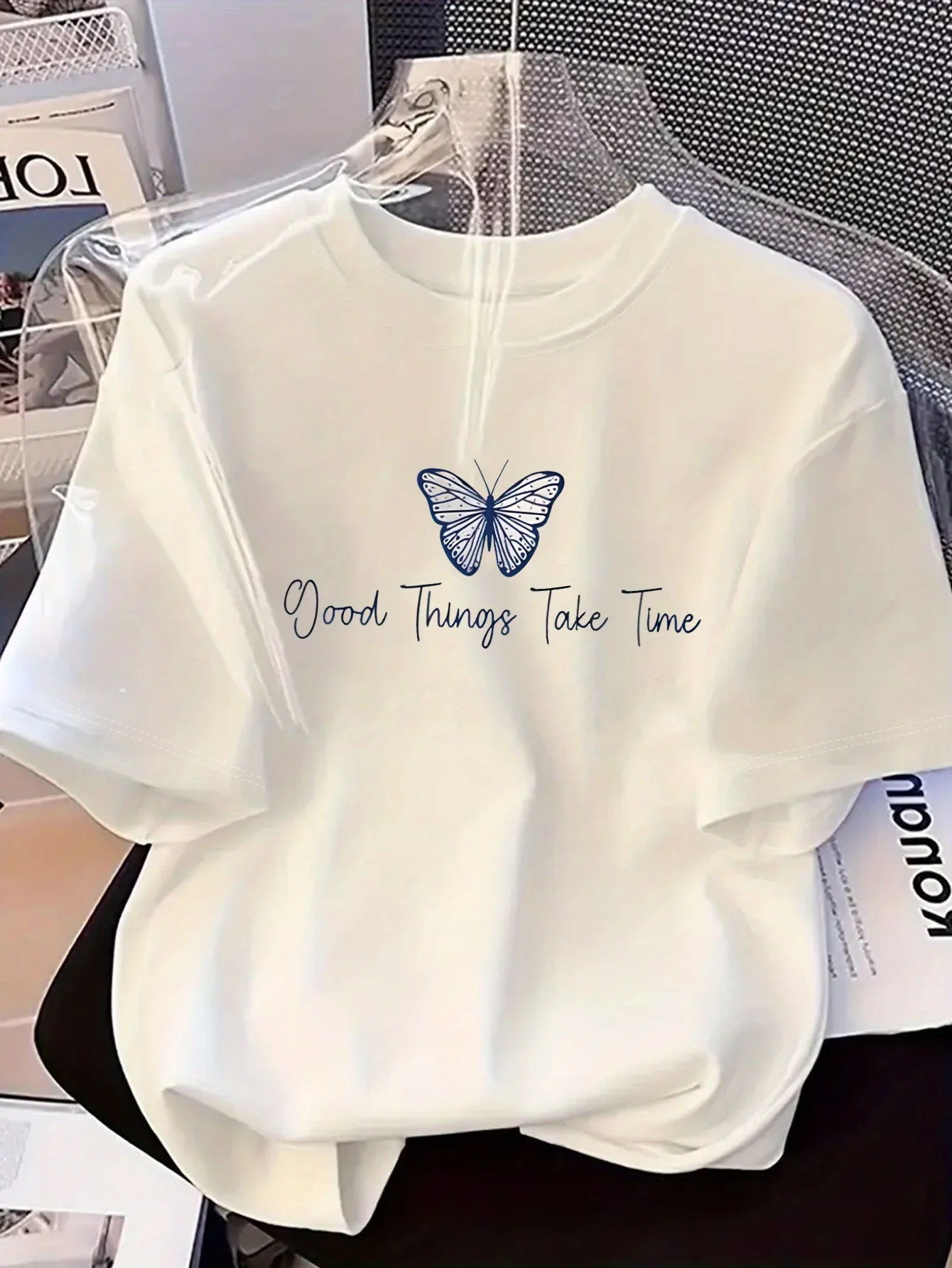 T-shirt damski z motylami na lato Czarny